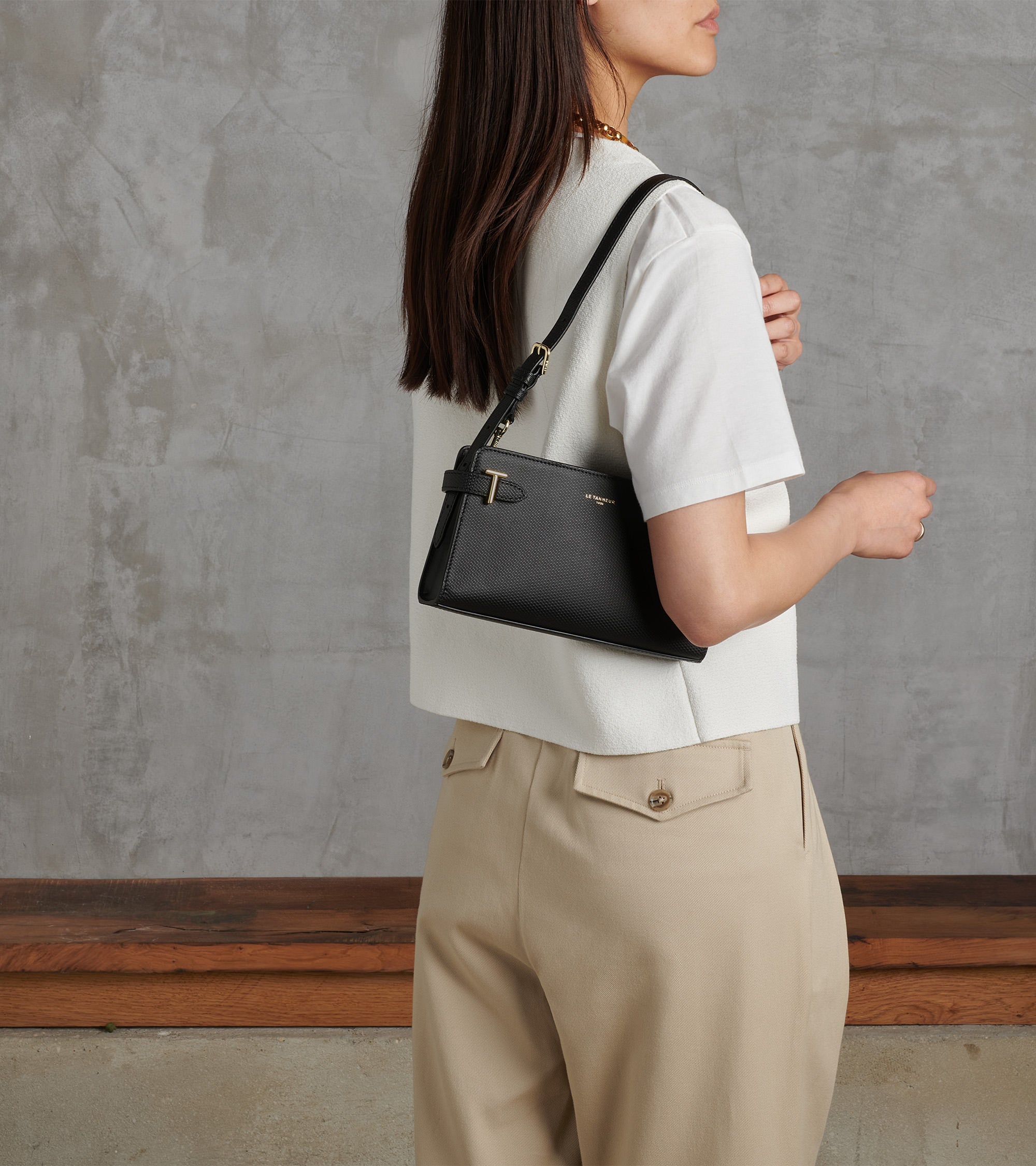 Emilie small shoulder bag in signature T leather