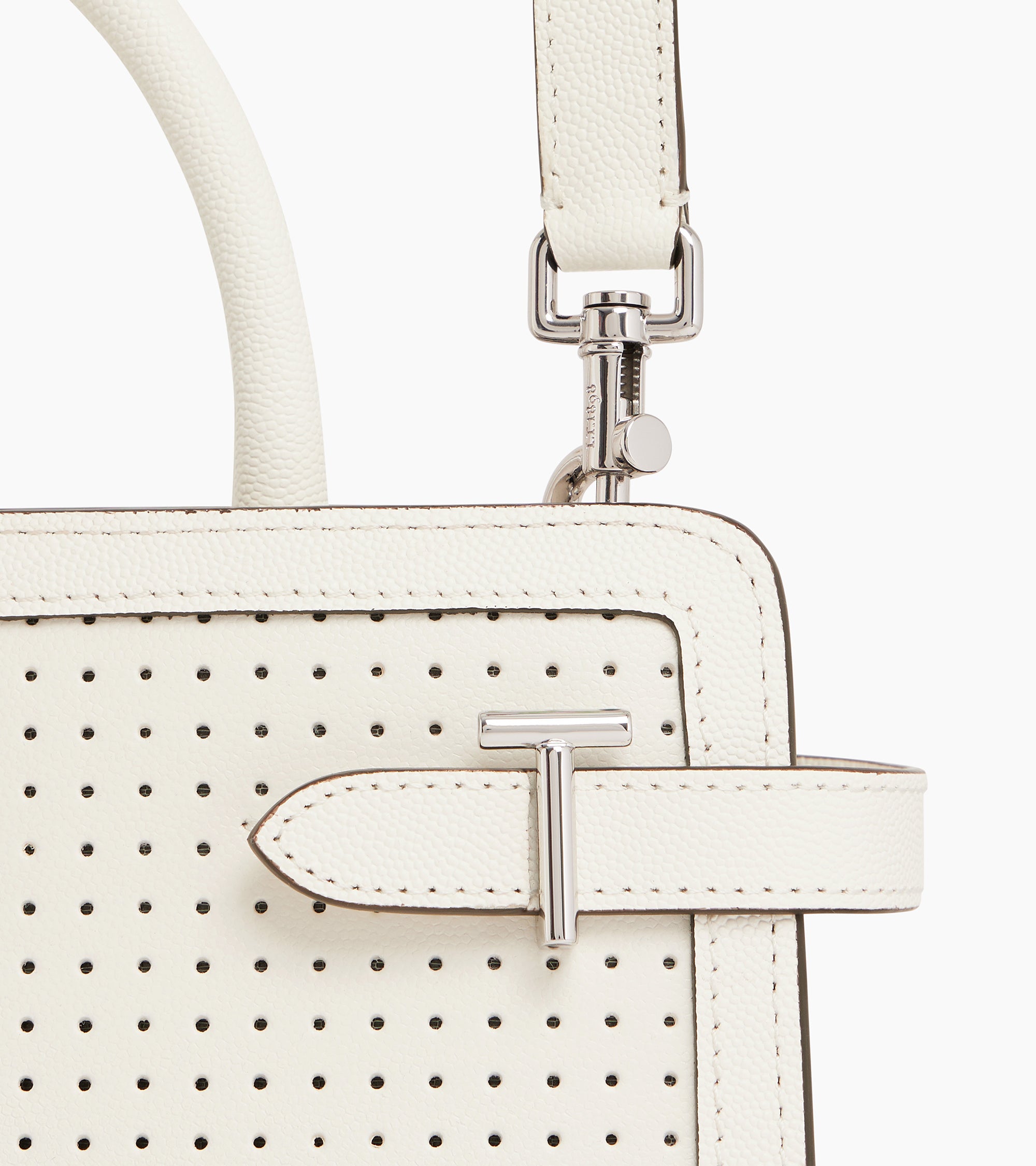 Emilie medium perforated handbag in caviar leather