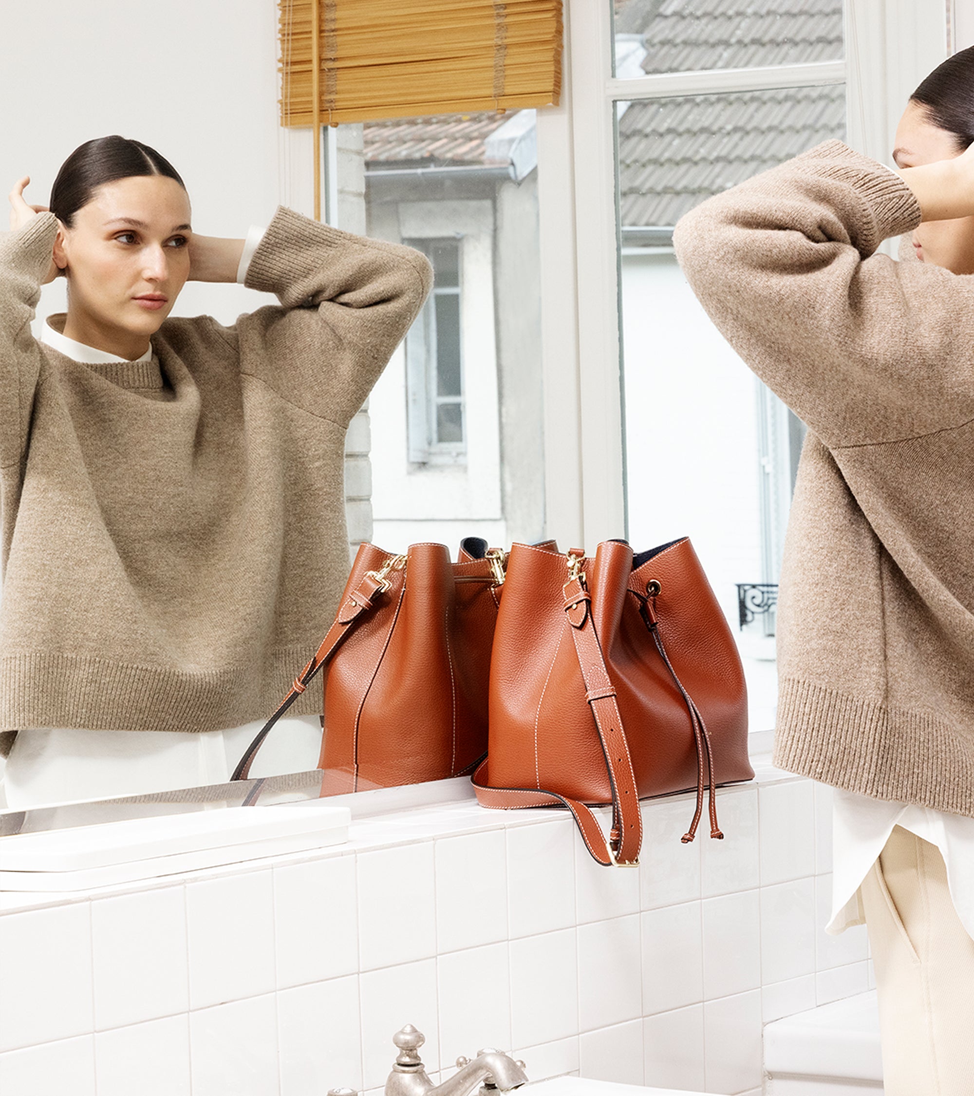 Louise large bucket bag in grained leather